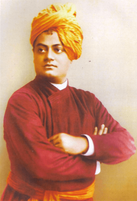 A photograph of Indian nationalist monk Swami Vivekananda from the waist up. He poses in three quart