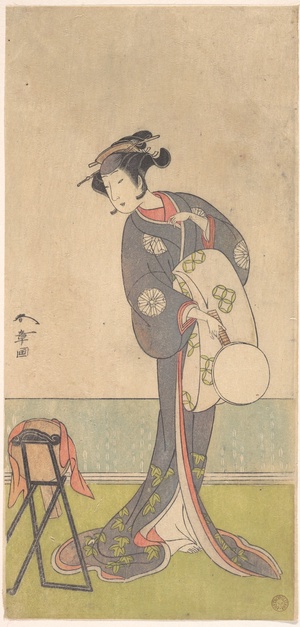 The First Nakamura Tomijuro as an Oiran Standing in a Room