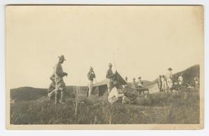 Photographic postcard of Charles Wilbur Rogan with his unit in the Philippines