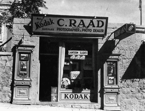 Black and white image of the storefront of Palestinian photographer, Khalil Raad’s studio on Jaffa R