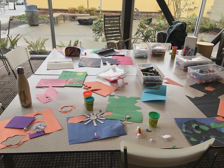 Craft supplies spread out on a table.