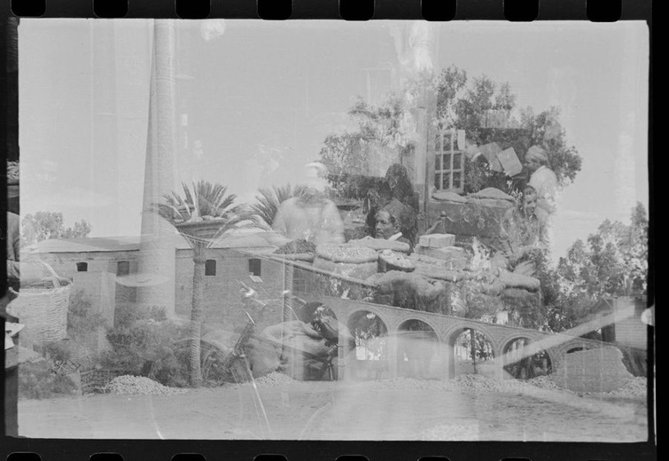 Double exposure image depicting an interior view of a shop in Egypt superimposed with an image of th