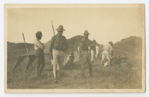Photographic postcard of Charles Wilbur Rogan with his unit in the Philippines