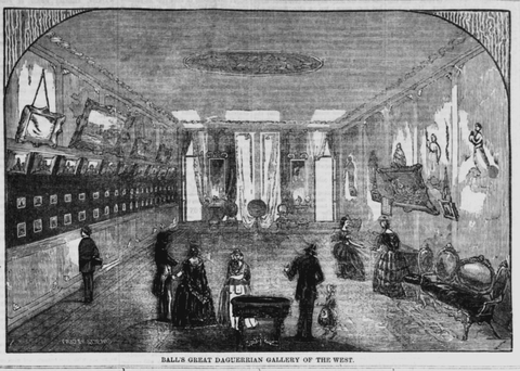 Black and white illustration of James Presley Ball’s Cincinnati art gallery. Framed artwork lines th