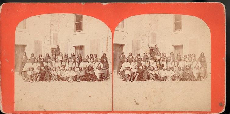 Group photograph in stereograph style of Native Americans of various tribes at Fort Marion, Florida.